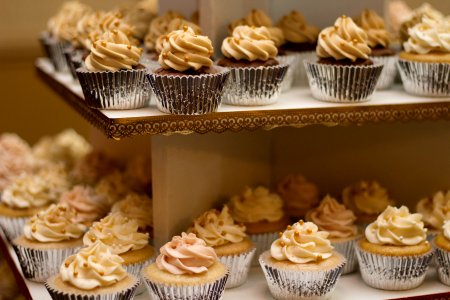 selective focus photo of 2-tiered cupcakes photo