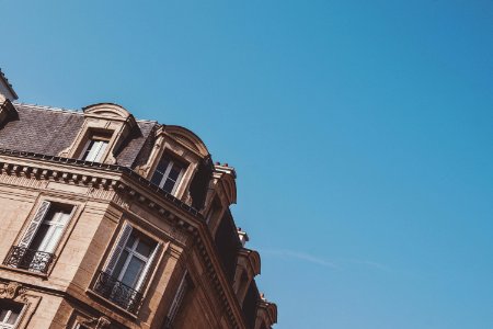 low angle photography of brown building during daytime photo