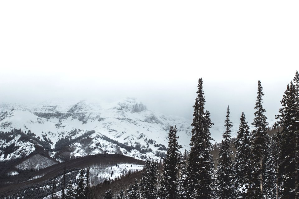 snow covered mountain during daytime