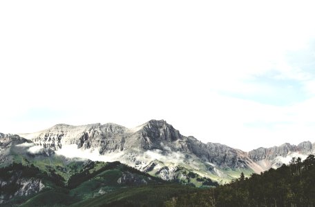 green mountains under blue sky photo