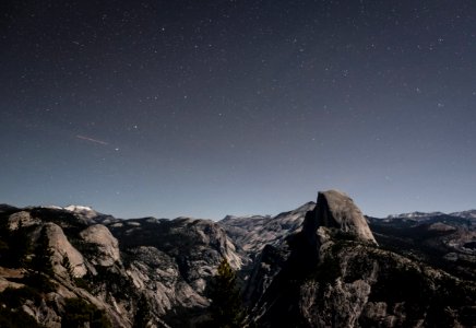 gray stone mountain at nighttime photo