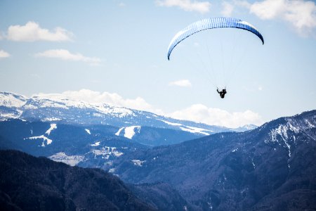 person doing xtreme sports parachute photo