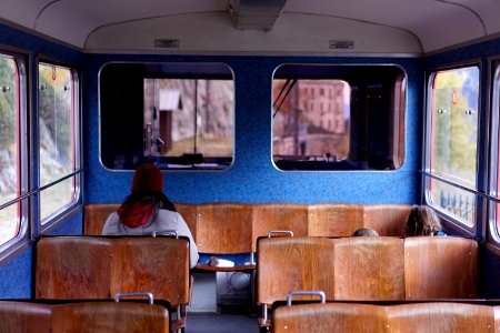 person sitting inside the train