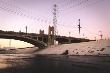 brown bridge under gray sky photo