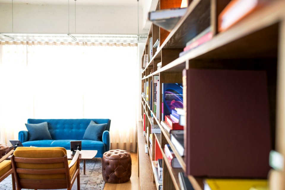 book filled wooden cabinet photo