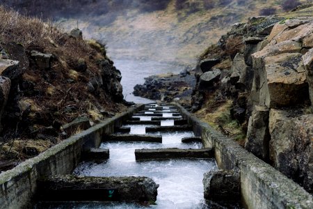 water dam between gray rock formation