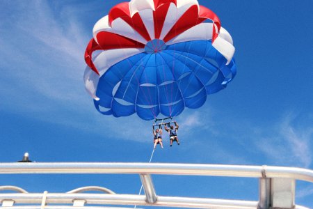 two person doing boat paragliding photo