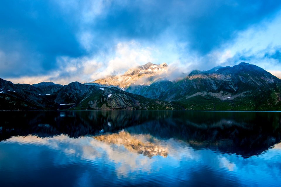 parorama photography of mountain under cloudy sky photo