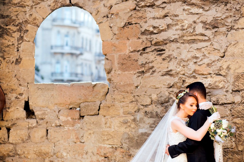 man and woman hugging each other photo