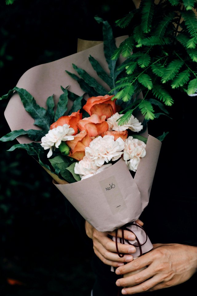 white and orange flower bouquet