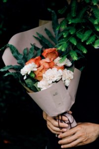 white and orange flower bouquet