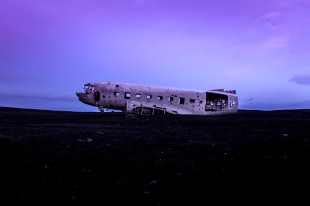 crashed airplane on brown soil