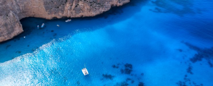 boat on body of water in aerial photography photo