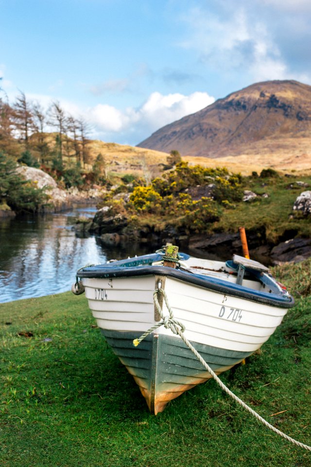 white boat near bodies of water