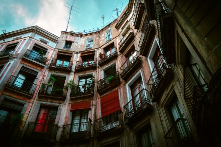 multicolored apartment building in low angle photography photo