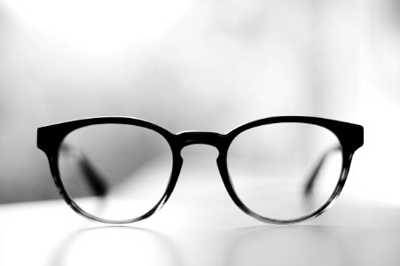 eyeglasses with black frames photo