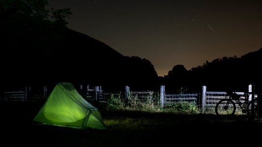 green outdoor tent on green grass