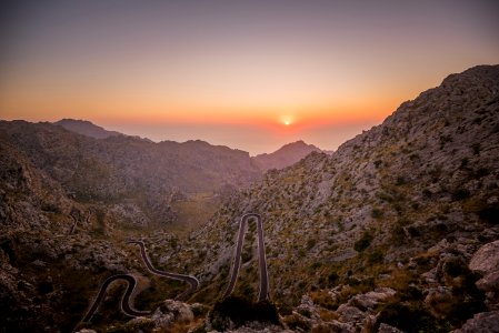 snake road in mountain field photo