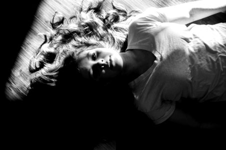 woman lying on floor photo