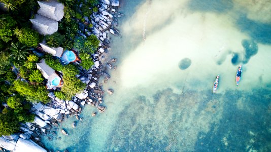 aerial shot photo of body of water near shore photo