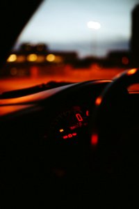 black car on road during sunset photo