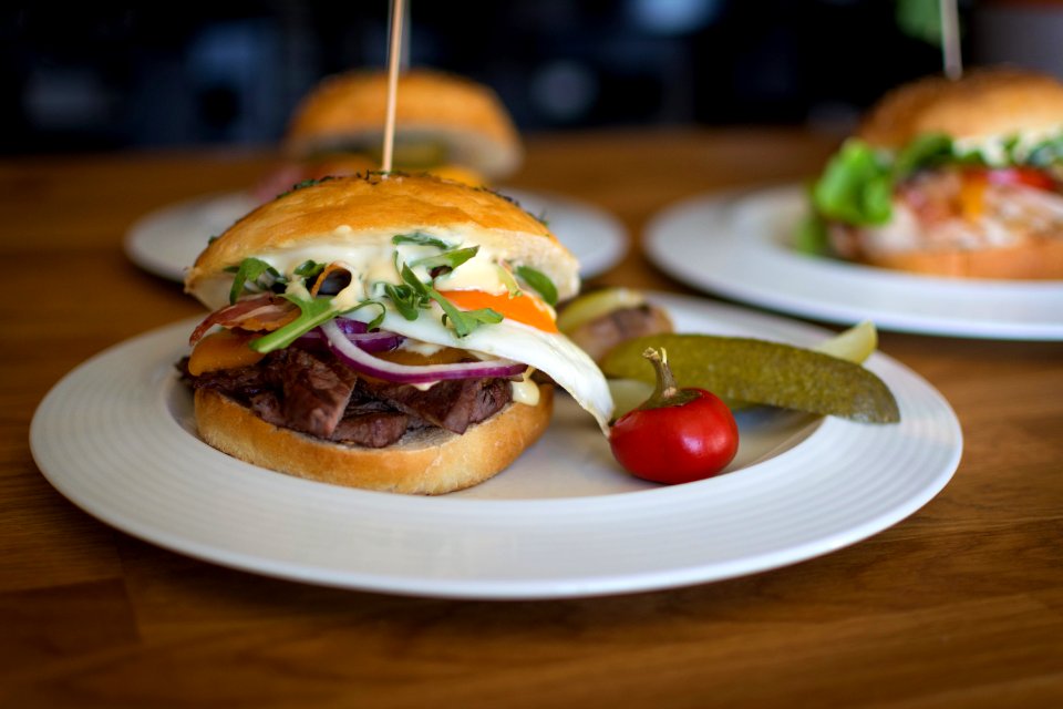 three plate of burgers photo