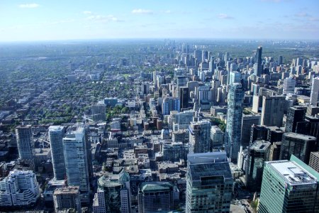 aerial view photography of city buildings under clear blue sky during daytime