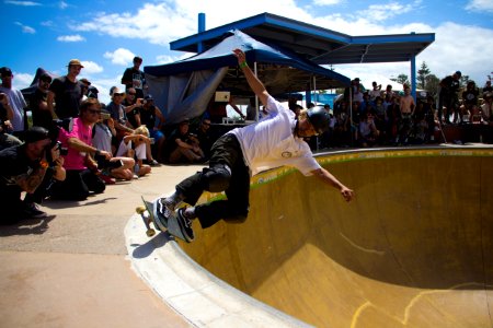man doing skateboard exhibition photo