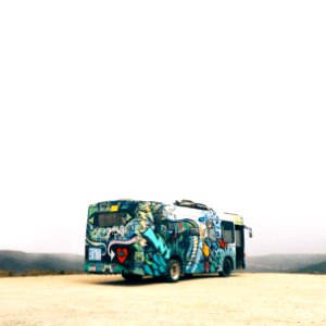 blue and white bus parked