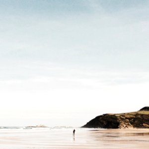 person standing on a wet land