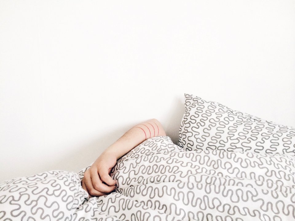 person lying on bed