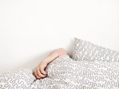 person lying on bed