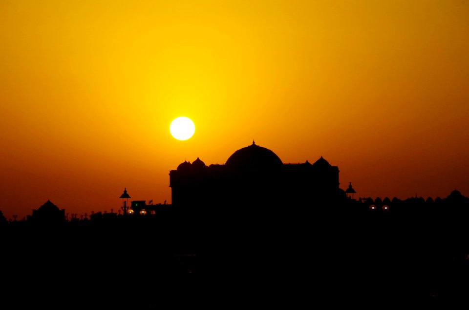 silhouette of dome building during golden hour