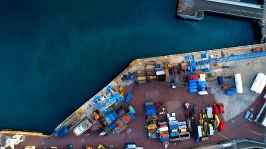 aerial photography of dock containers near body of water during daytime photo