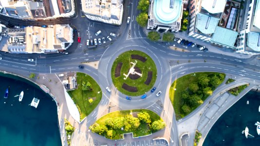 aerial photography of road where vehicles travelling and buildings during daytime photo