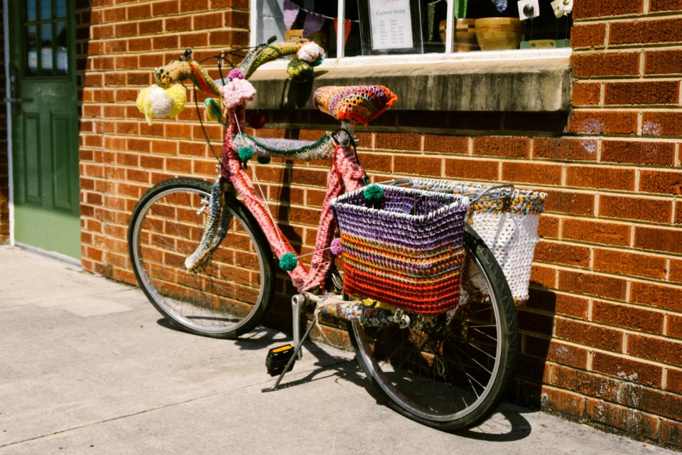 bike parked on brown concrete wall