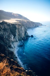 photo of cliff near shore