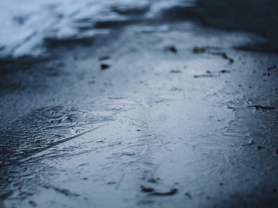 water droplets on gray concrete floor