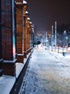 brown brick building covered with snow during daytime photo