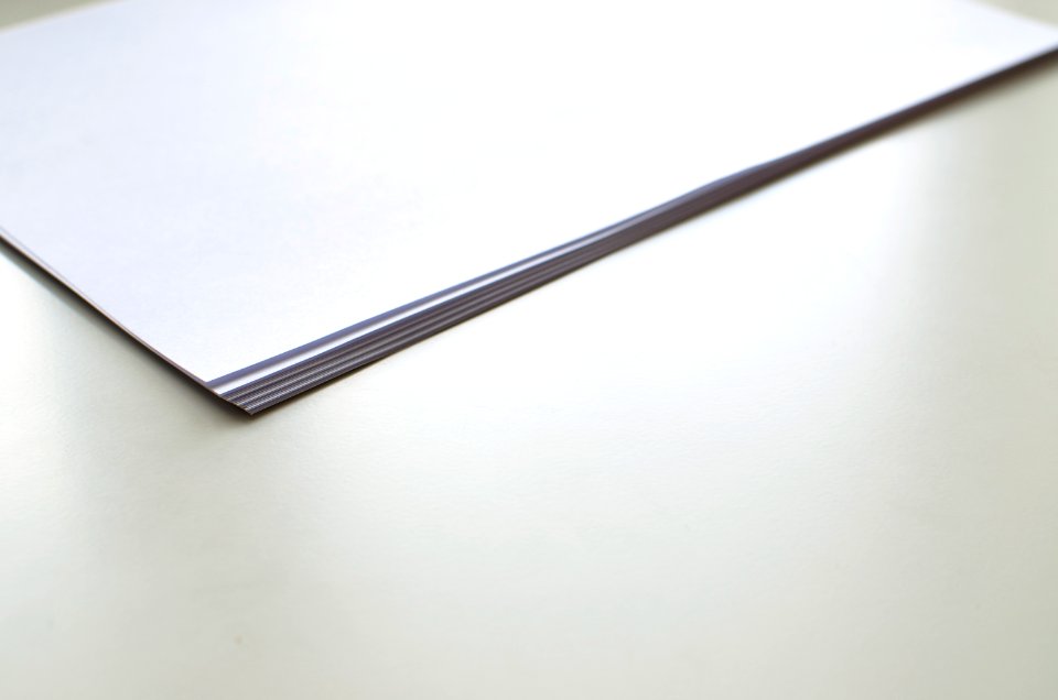 white papers on table