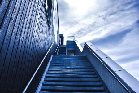 photo of staircase under blue sky during daytime