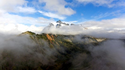 foggy mountain during daytime photo