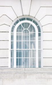 glass window with white steel frame photo
