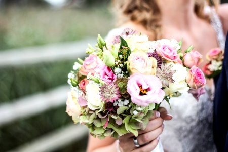 woman holding bouquet of flowers photo