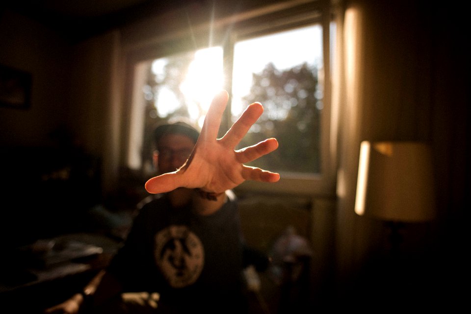 shallow focus photography of man hand photo