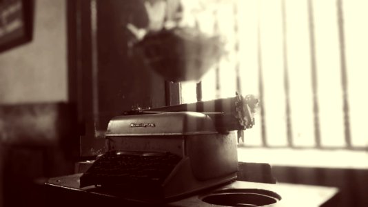 grayscale photo of Remington typewriter photo