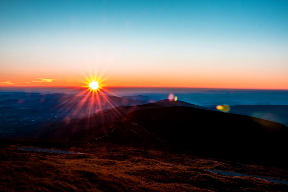 silhouette photography of mountain during golden hour