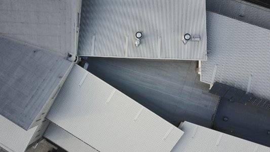 A drone shot of white industrial buildings photo