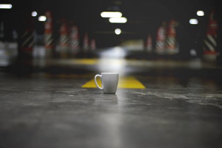 white ceramic mug in middle photo