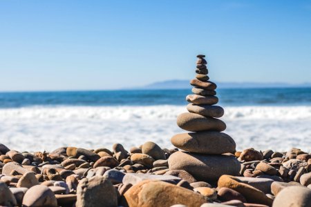 stack rock on seashore photo